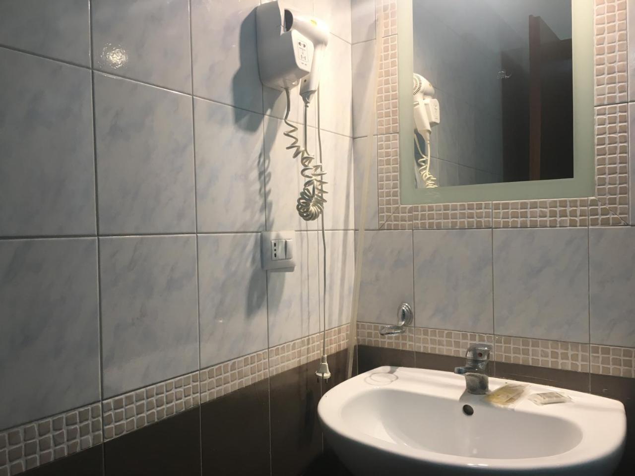 Camera Quadrupla Economy con Bagno in Comune